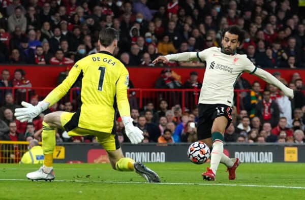 Liverpool's Mohamed Salah (right) scores his side's fifth goal and completes his hat trick during the Premier League match at Old Trafford, Manchester. Picture date: Sunday October 24, 2021.