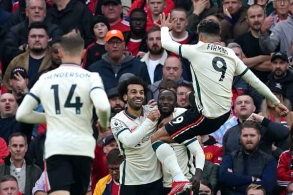 Liverpool's Naby Keita (center) celebrates their team's first goal in the game with teammates during the Premier League match at Old Trafford, Manchester. Picture date: Sunday October 24, 2021.